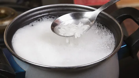 Getty Images Parboiling rice in pre-boiled water for five minutes before draining can help reduce arsenic levels (Credit: Getty Images)